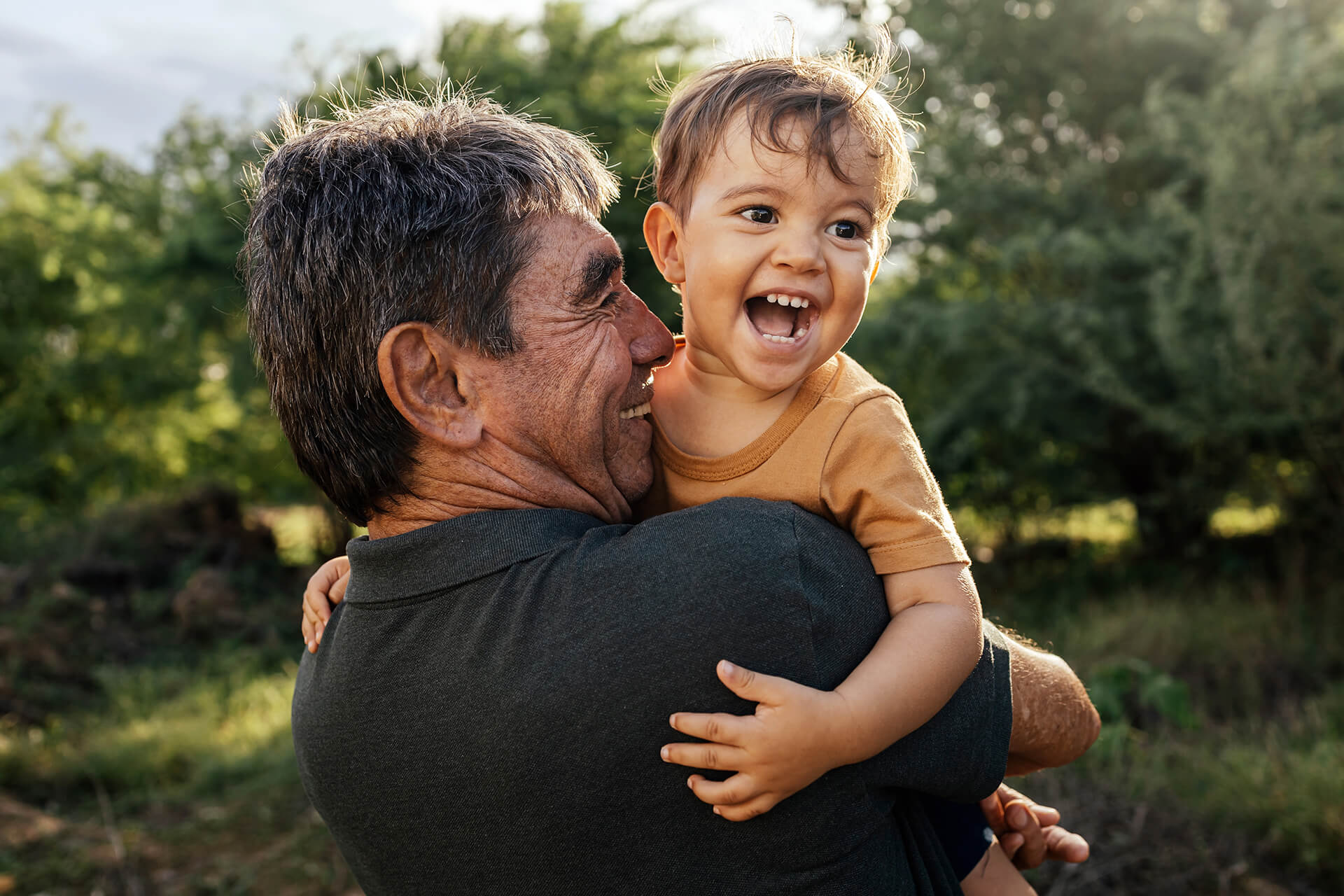 Person hugging their grandson