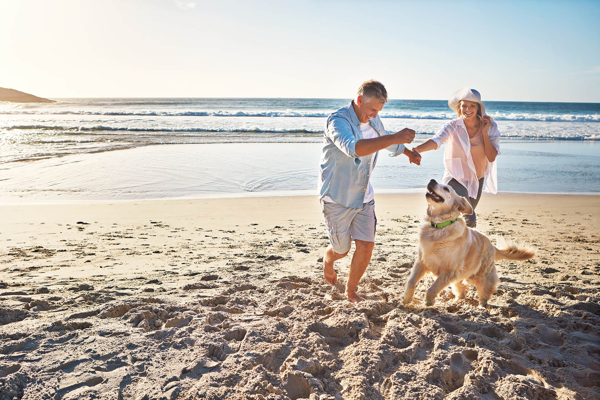 Happy Couple Dancing on a Beach